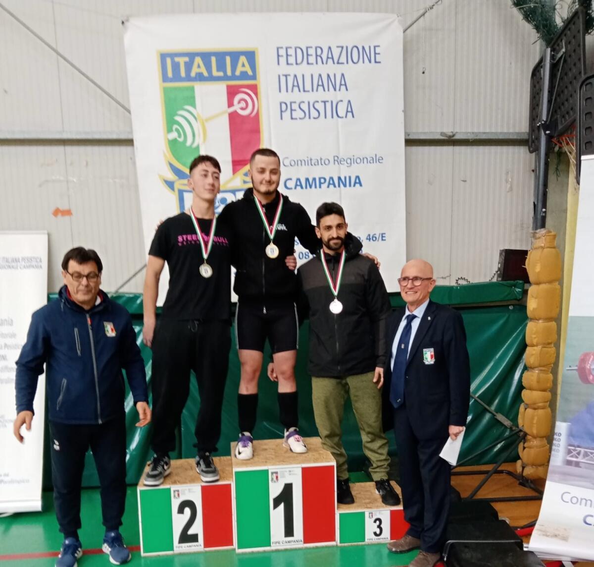 Gemelli Dente Campioni di Pesistica - 