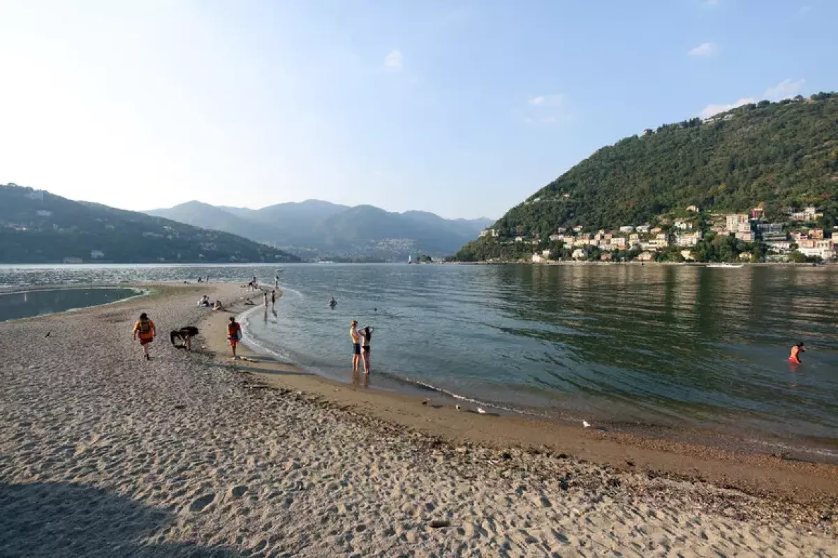 Tragedia al Tempio Voltiano: bimba di 10 anni scompare dopo un tuffo nel lago - 